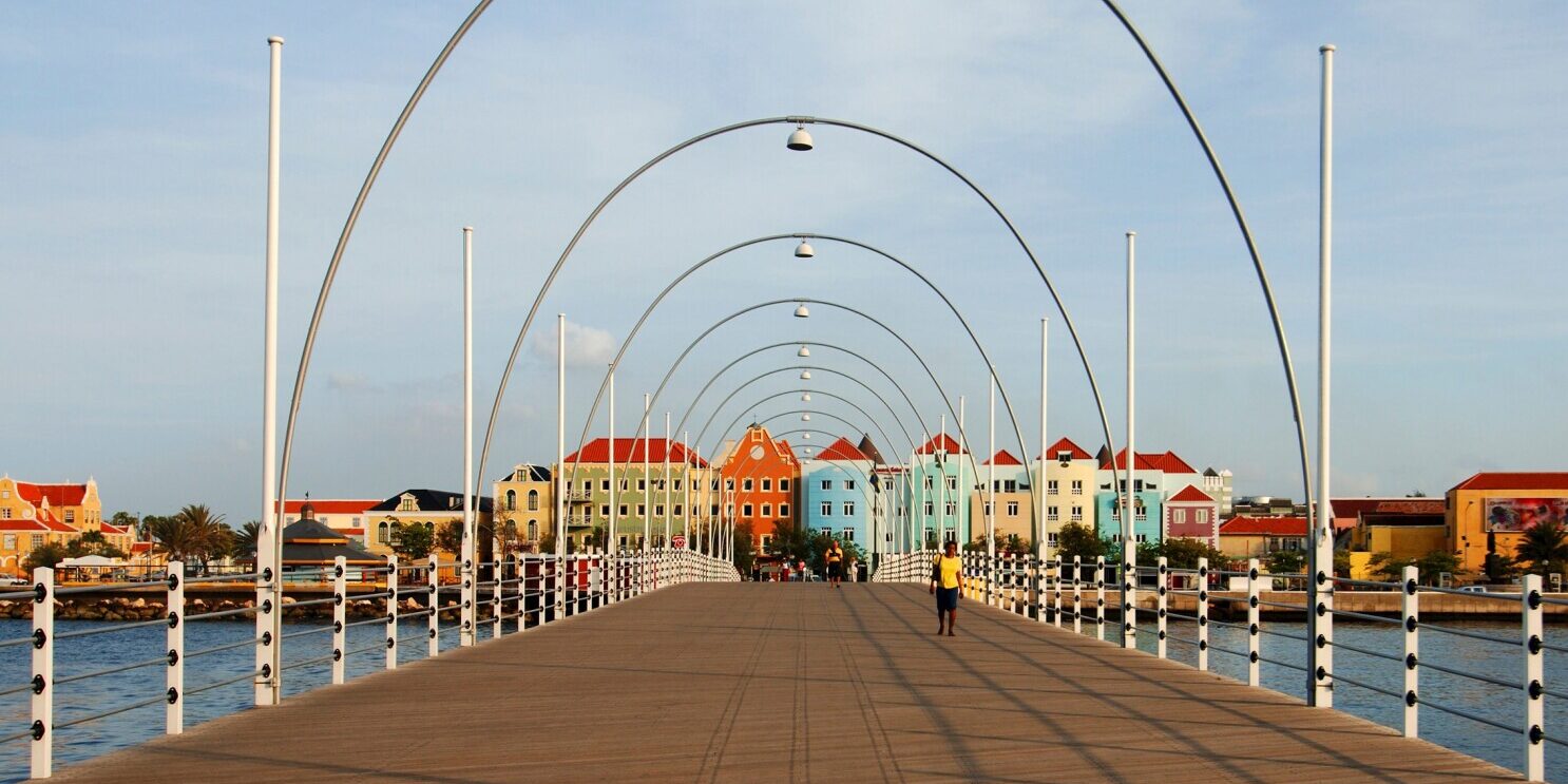 Curacao, Willemstad, queen emmabridge, the waterfront houses of Punda on the Handelskade, facing the Sint Annabaai